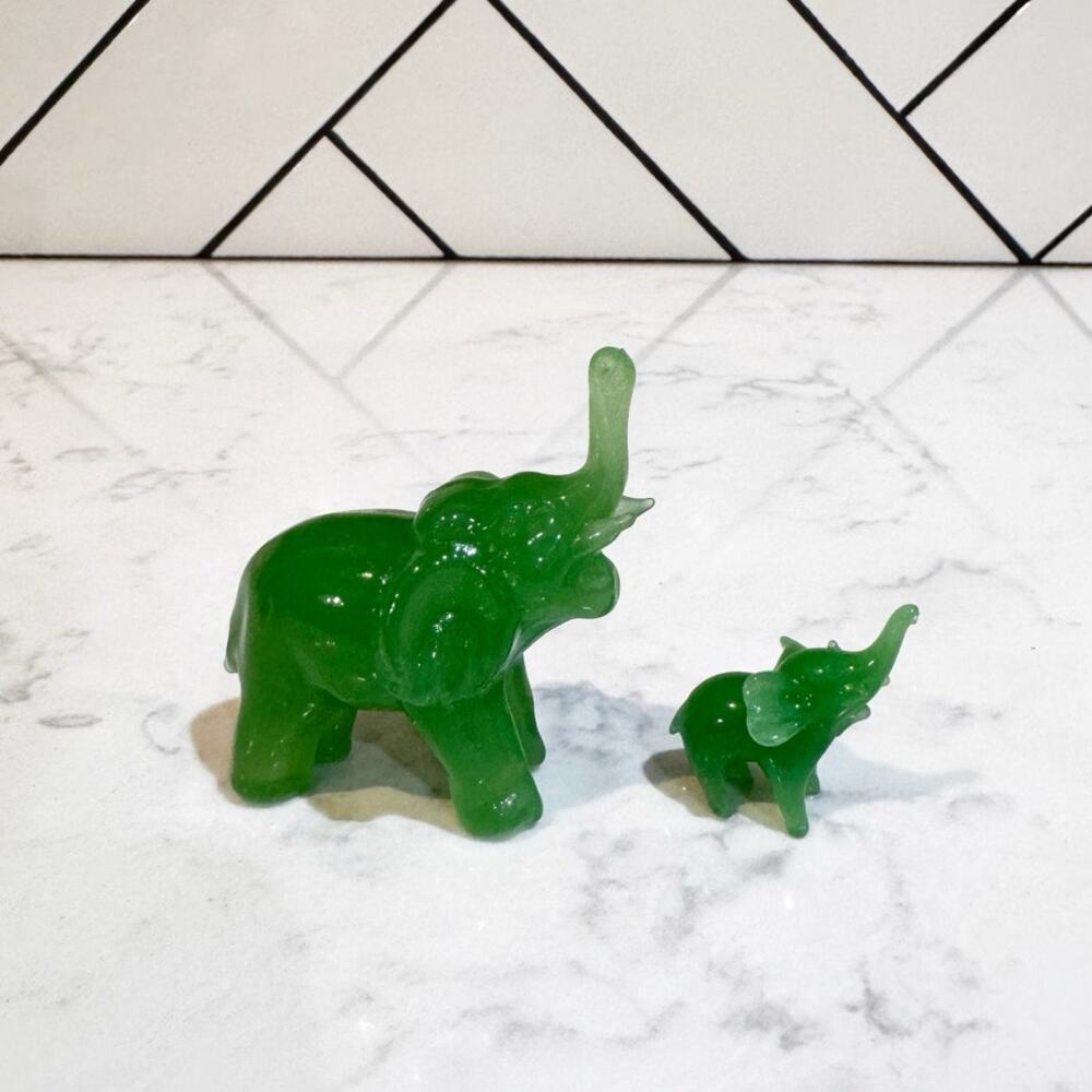 green glass trunk-up lucky elephant figurines 90s trinket bohemian eclectic